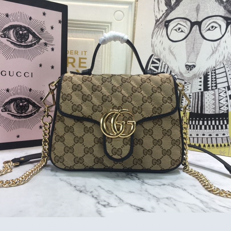 G*u*i top handle bags